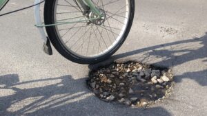 Pothole (copyright Simon MacMichael).jpg