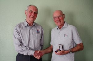 John Else (right) received medallion from Dave Wall former chair of Association of British Cycling Coaches.JPG