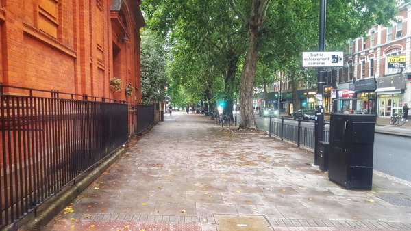 Chiswick High Road pavement outside church at junction with Duke’s Avenue