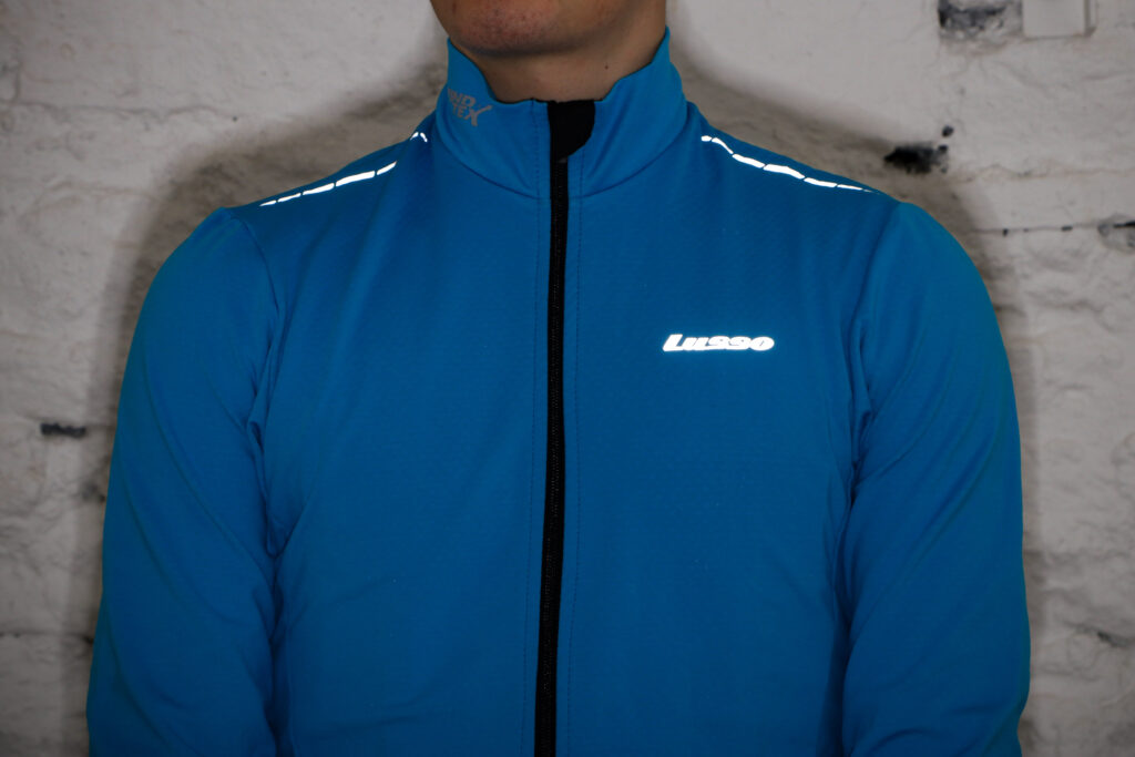 Lusso Aqua Repel Jacket – reflective front.jpg