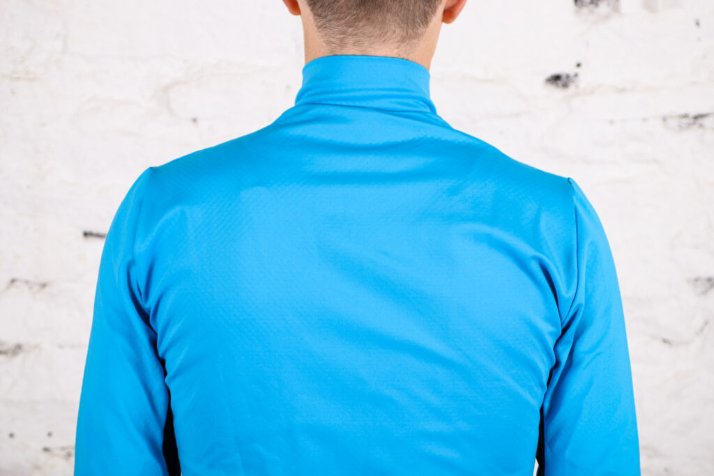 Lusso Aqua Repel Jacket – shoulders back.jpg