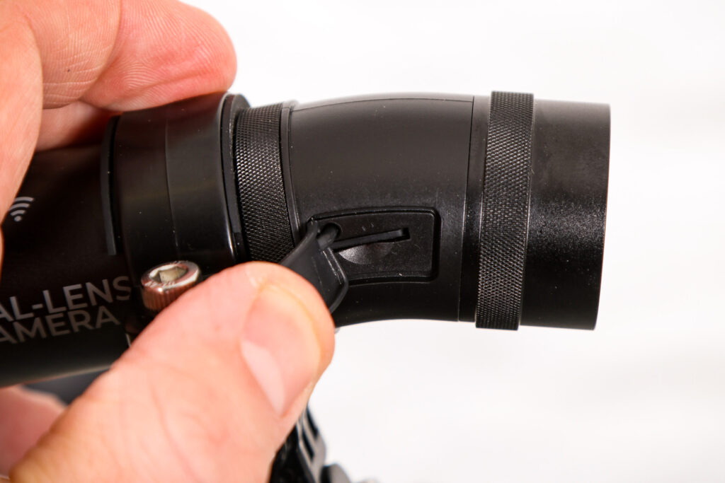 Techalogic DC-1 Dual Lens helmet Camera – memory card port.jpg