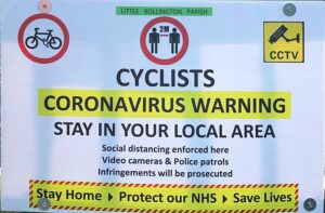 coronavirus pandemic Cyclists stay local sign