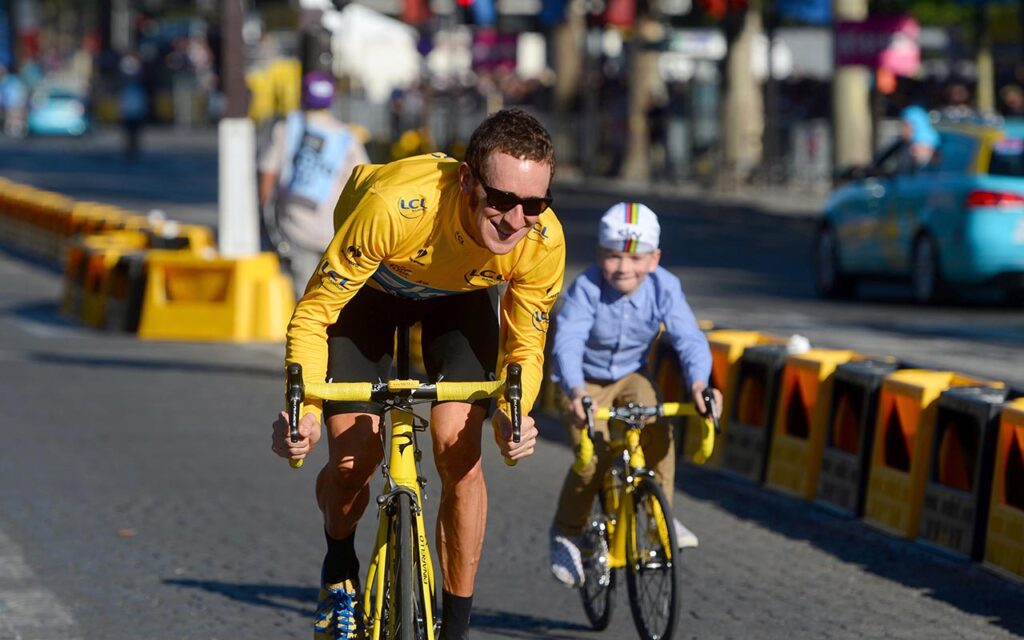 Bradley Wiggins and son Ben on the Champs-Elysees (picture courtesy Le Coq Sportif)