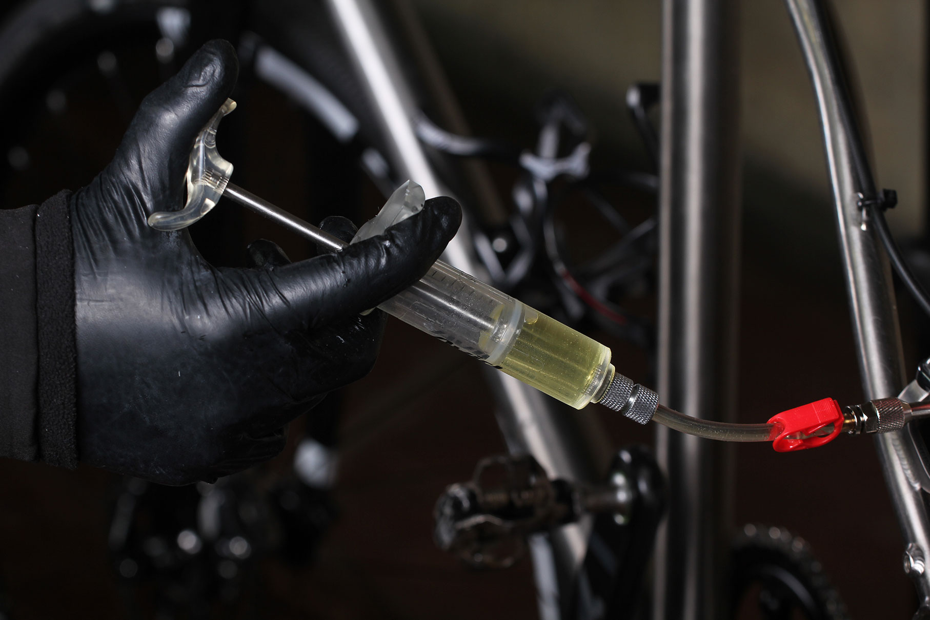 apply pressure to calliper syringe