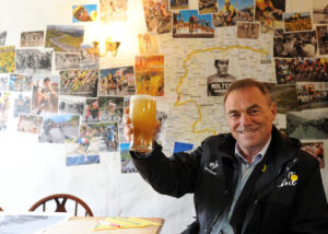 Bernard Hinault has a pint at the Robin Hood pub