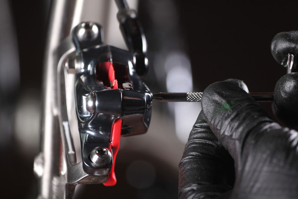 Remove pad carrier bolt.jpg