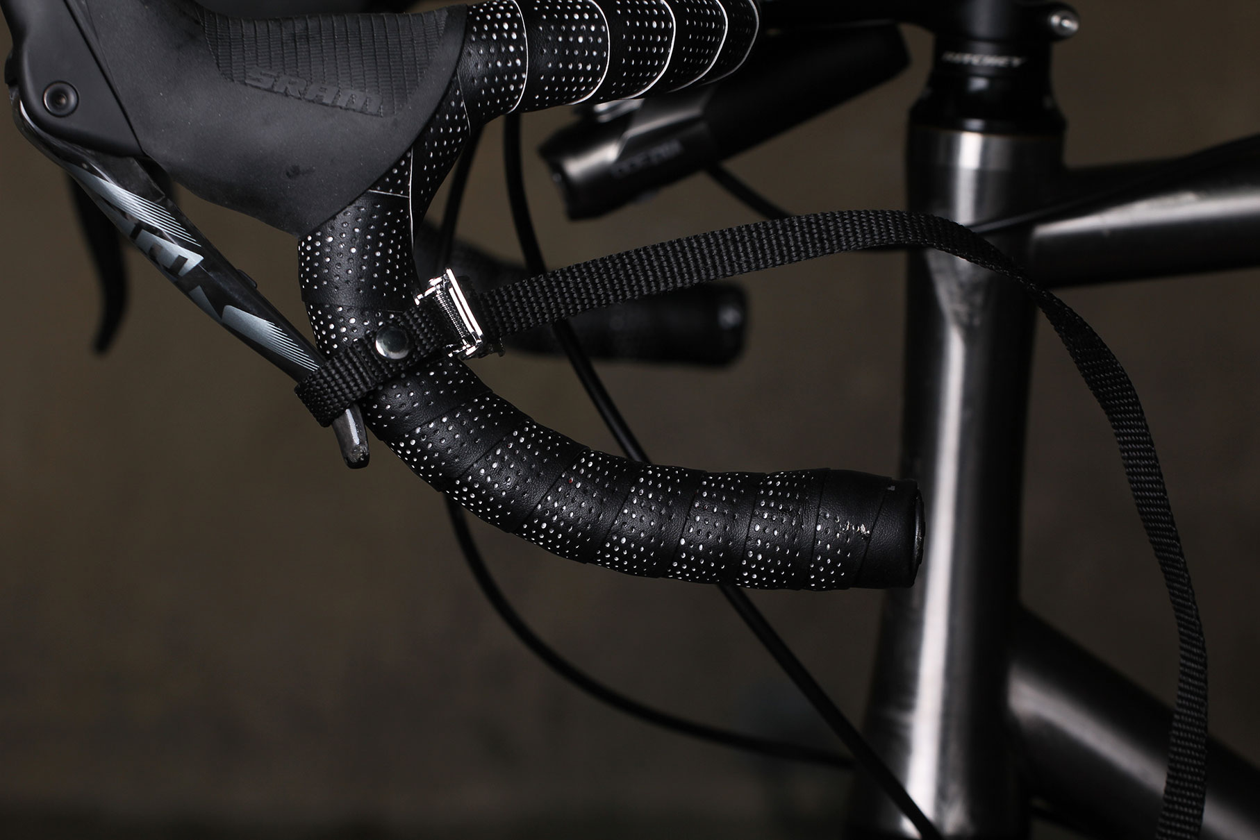tie lever back to bar
