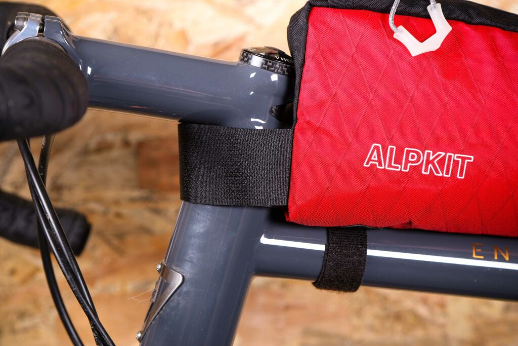 2020 Alpkit Fuel Pod – head tube strap.jpg