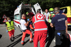 LOMBARDIA 2020 – Evenepoel taken to ambulance, LaPresse, RCS Sport.JPG