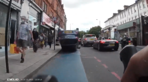 overturned car in cycle lane – august 2020.PNG