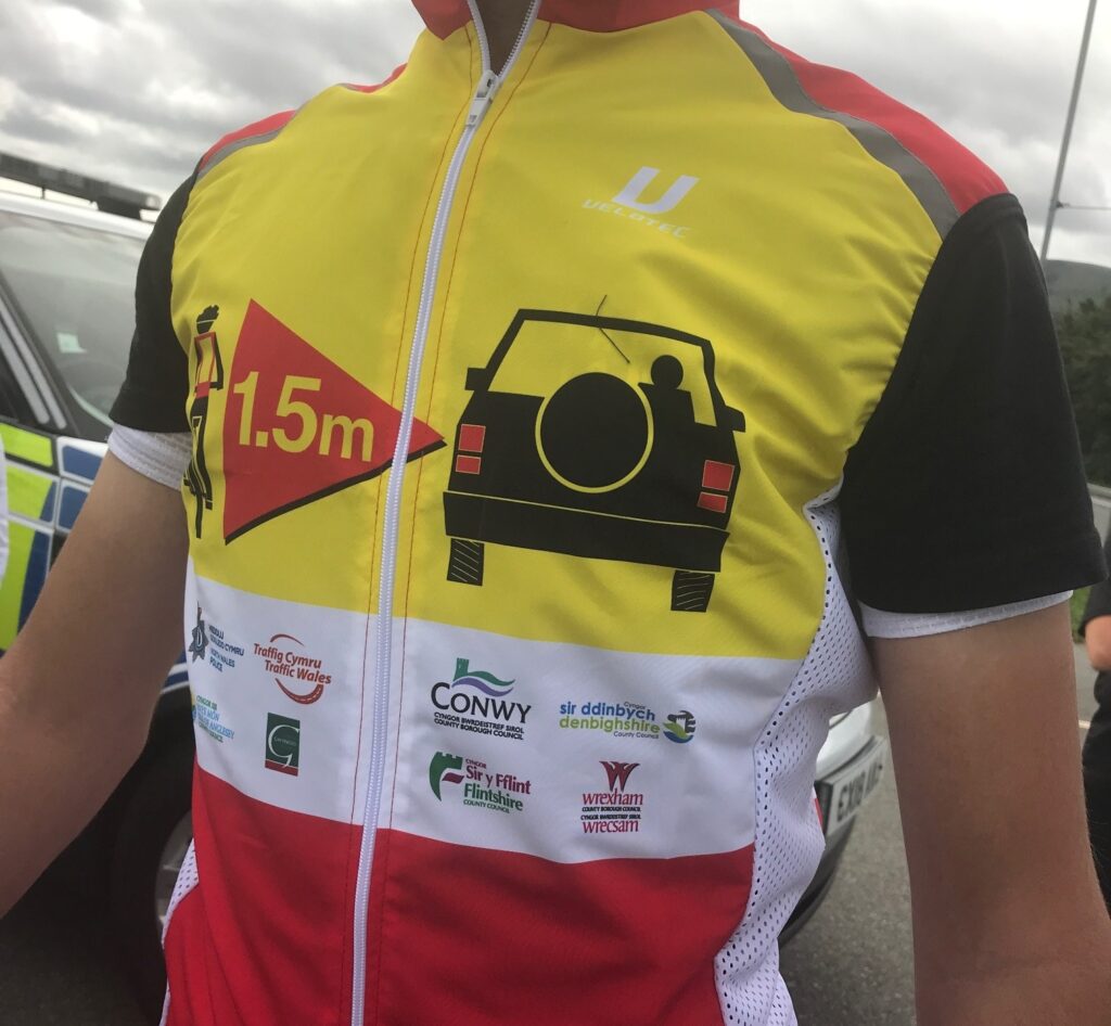 Safe passing distance gilet close up