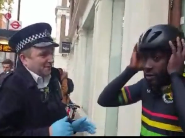 Metropolitan Police officer searches Mani Arthur (via Instagram).PNG