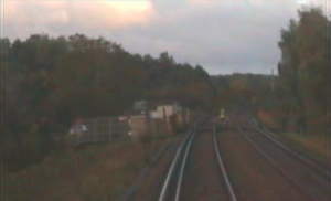Cyclist on level crossing near Canterbury (via Network Rail).PNG