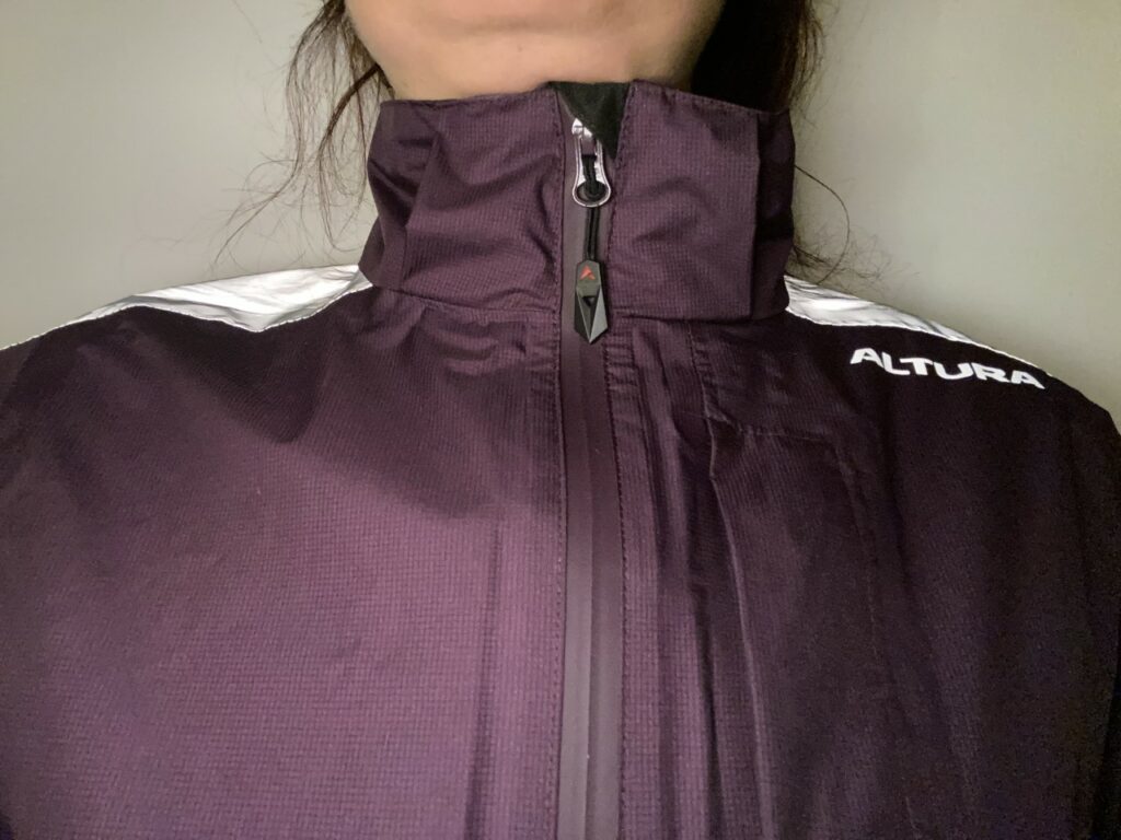 2021 Altura Nightvision Typhoon Ladies Jacket high collar and zip guard.jpg
