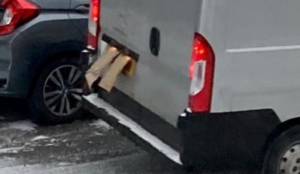 Driver covering number plate from LTN camera