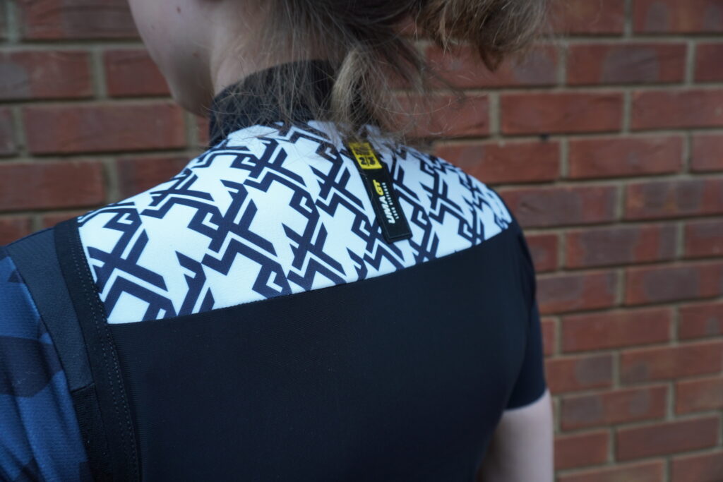 2021 Assos UMA GT Spring Fall Airblock Vest back top.JPG