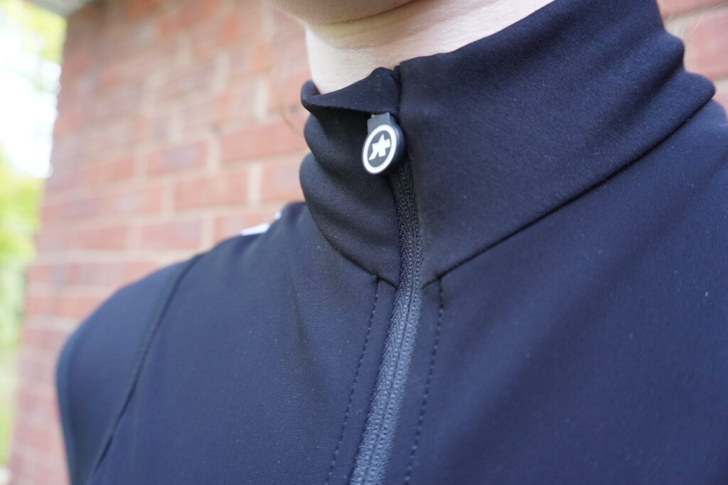 2021 Assos UMA GT Spring Fall Airblock Vest zip top.JPG
