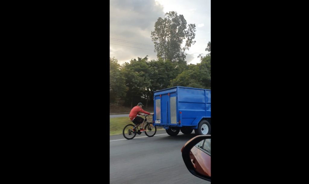 Aussie cyclist hitches a lift