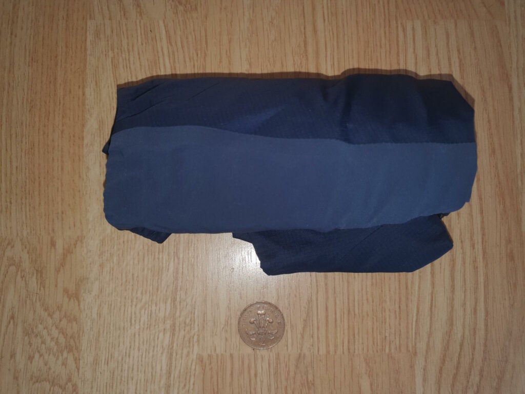 2021 dhb Aeron Lab Superlight Waterproof gilet rolled.jpeg
