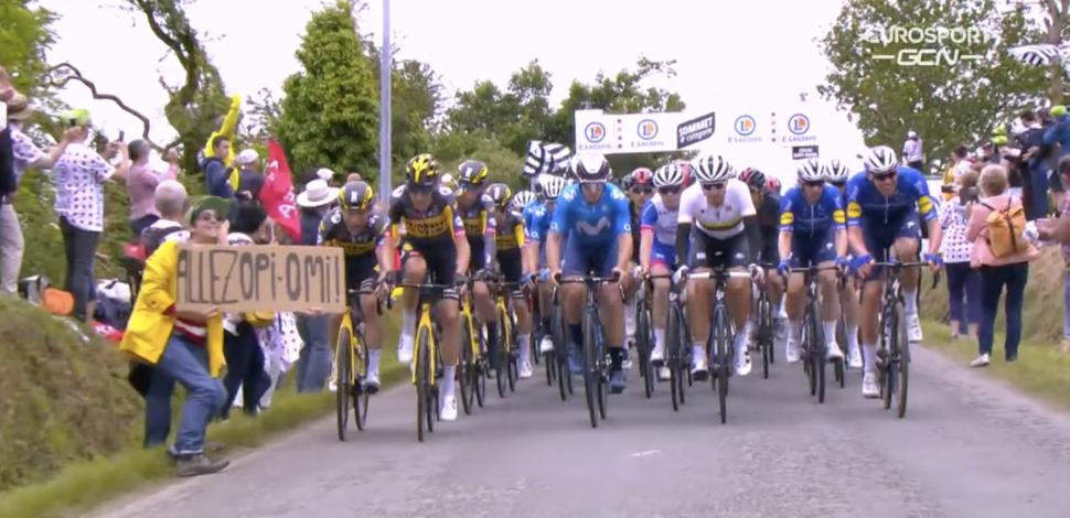 Tour de France spectator with placard