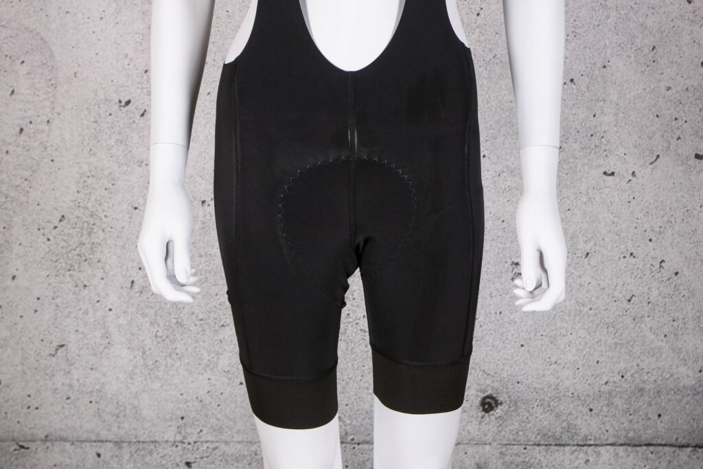2021 Megmeister Womens L8 Bib Shorts &ndash; legs front.jpg