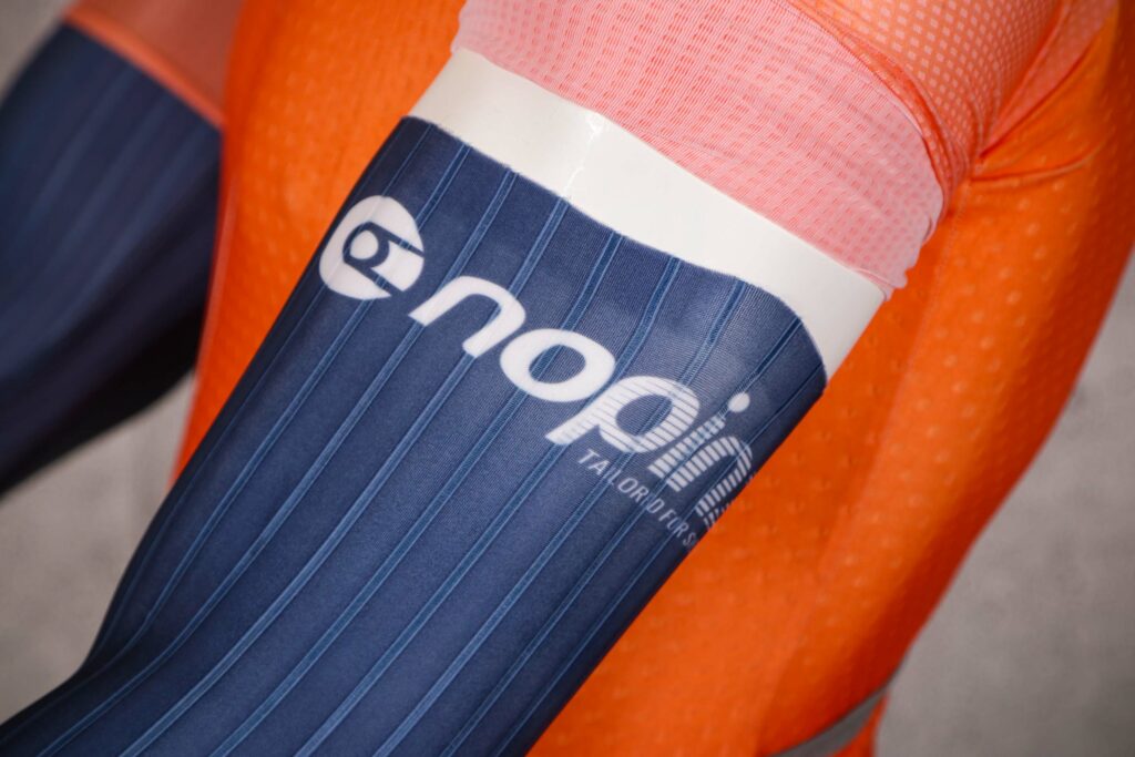 2021 Nopinz Pro-1 Arm warmers – Aero – cuff logo.jpg