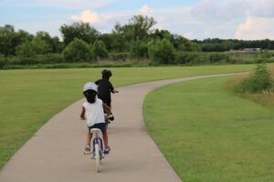 Children cycling stock image