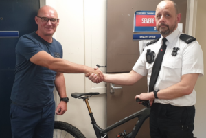 Jamie Taylor reunited with his bike (picture credit Merseyside Police).PNG