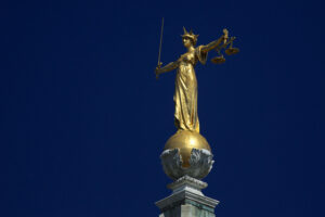 Statue of Justice, Old Bailey (licensed CC BY 2.0 on Flickr by Ronnie Macdonald).jpg