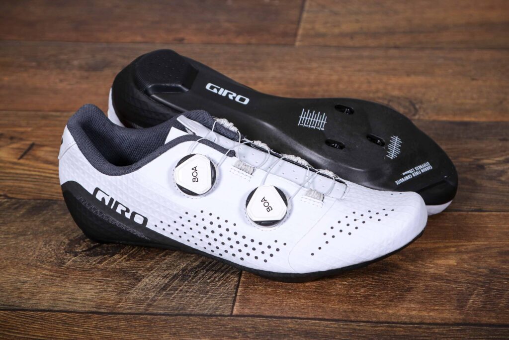 White Giro Regime Women’s Road Cycling Shoes pictured on wooden floor