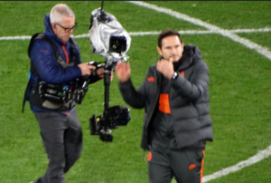 Look mum, no hands! Frank Lampard caught on camera by Cycling Mikey allegedly juggling coffee and phone at wheel