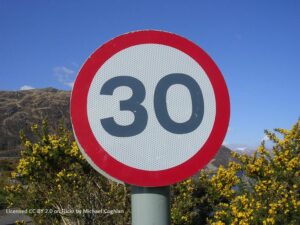 30mph sign (licensed CC BY 2.0 on Flickr by Michael Coghlan)