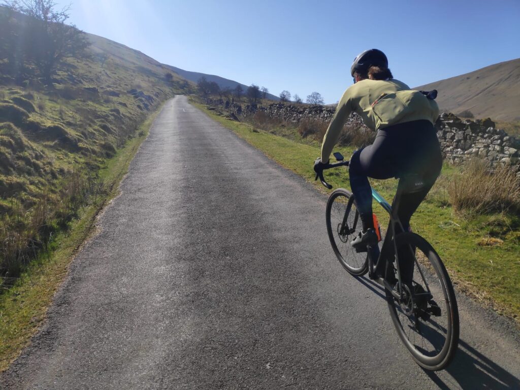 Anna riding climb feature