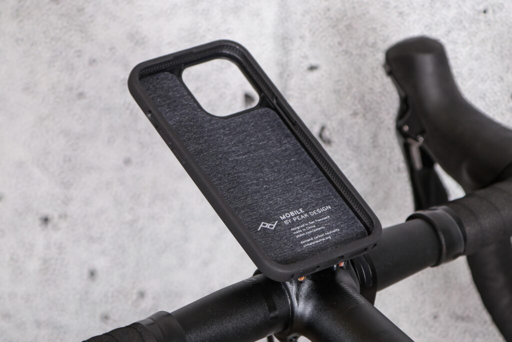 2022 Peak Design Everyday Case for iPhone and Out Front Bike Mount – case on bars portrait.jpg