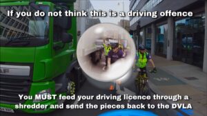 Lorry driver close passes police officer