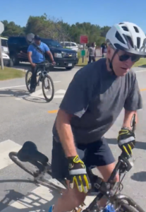 Biden falls off bike