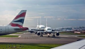 Aircraft queueing at London Heathrow Airport – Licensed CC BY 2.0 by Phillip Capper.jpg