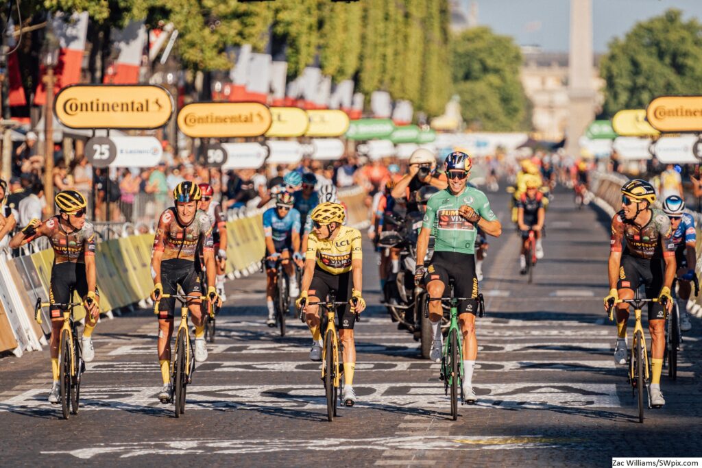 Jumbo-Visma cross the line on the Champs-Élysées at the 2022 Tour de France (Zac Williams, SWpix.com)