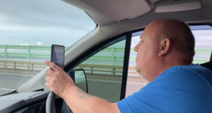 Phone-driving go slow lorry driver