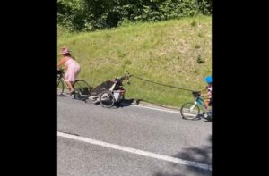 tour de france stage 9 woman cycling children up hill – screenshot via ProCyclingStats on Twitter