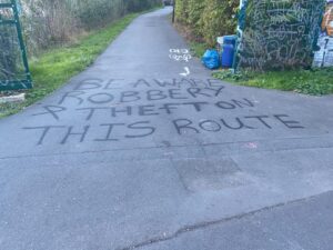 Graffiti warning cyclists on C10