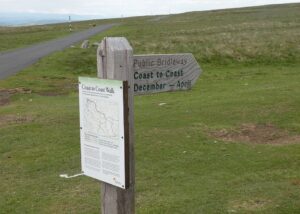 Coast to Coast Walk sign – CC BY-SA 2.0 by geograph.org.uk on Wikimedia Commons