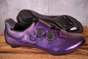 Purple Liv Macha Pro Shoes on wooden surface in studio