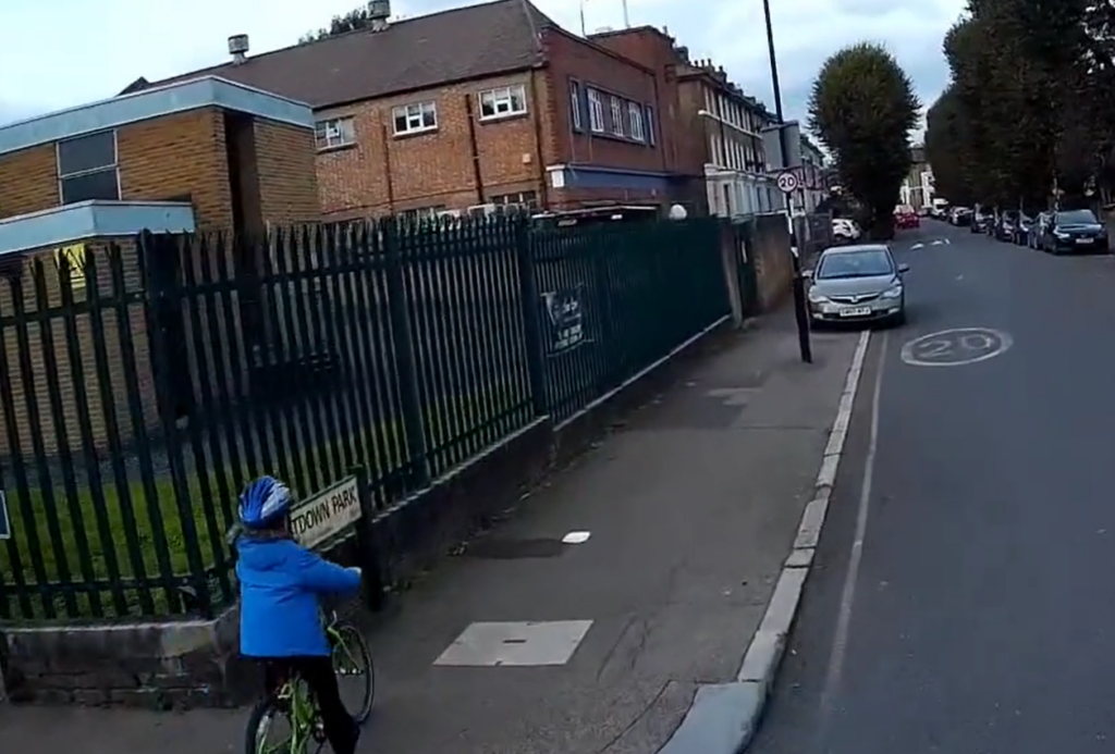 Driver mounts pavement and chastises child for riding on same footpath (Greg N, Twitter)
