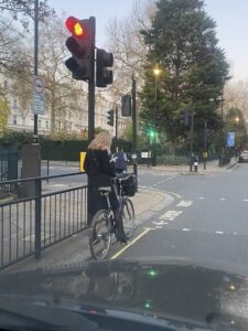 Driver – using phone – takes photo of cyclist using phone (credit – Kevo2205, Twitter)