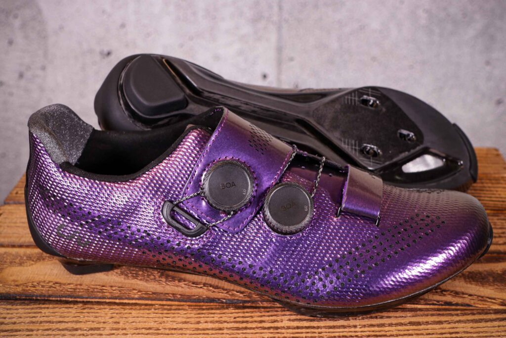 Purple Liv Macha Pro Shoes on wooden surface in studio