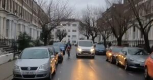 Van driver and cyclist pass on busy London road (Lauren O’Brien, Twitter)