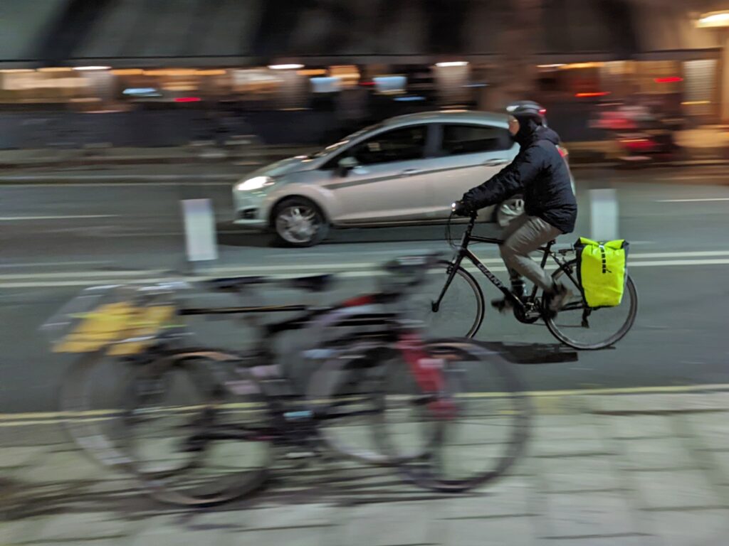 Cyclist and car (copyright Simon MacMichael)