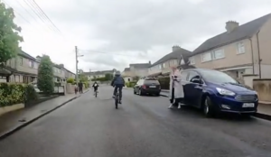 Motorist berates children for riding in middle of the road on way home from school